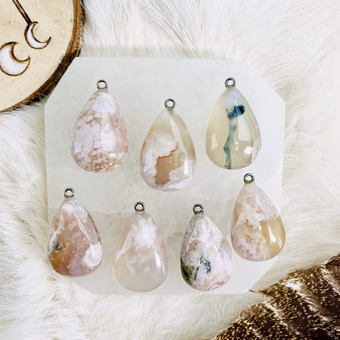 Flower Agate Tumbled Pendants with Silver Bail on white background.