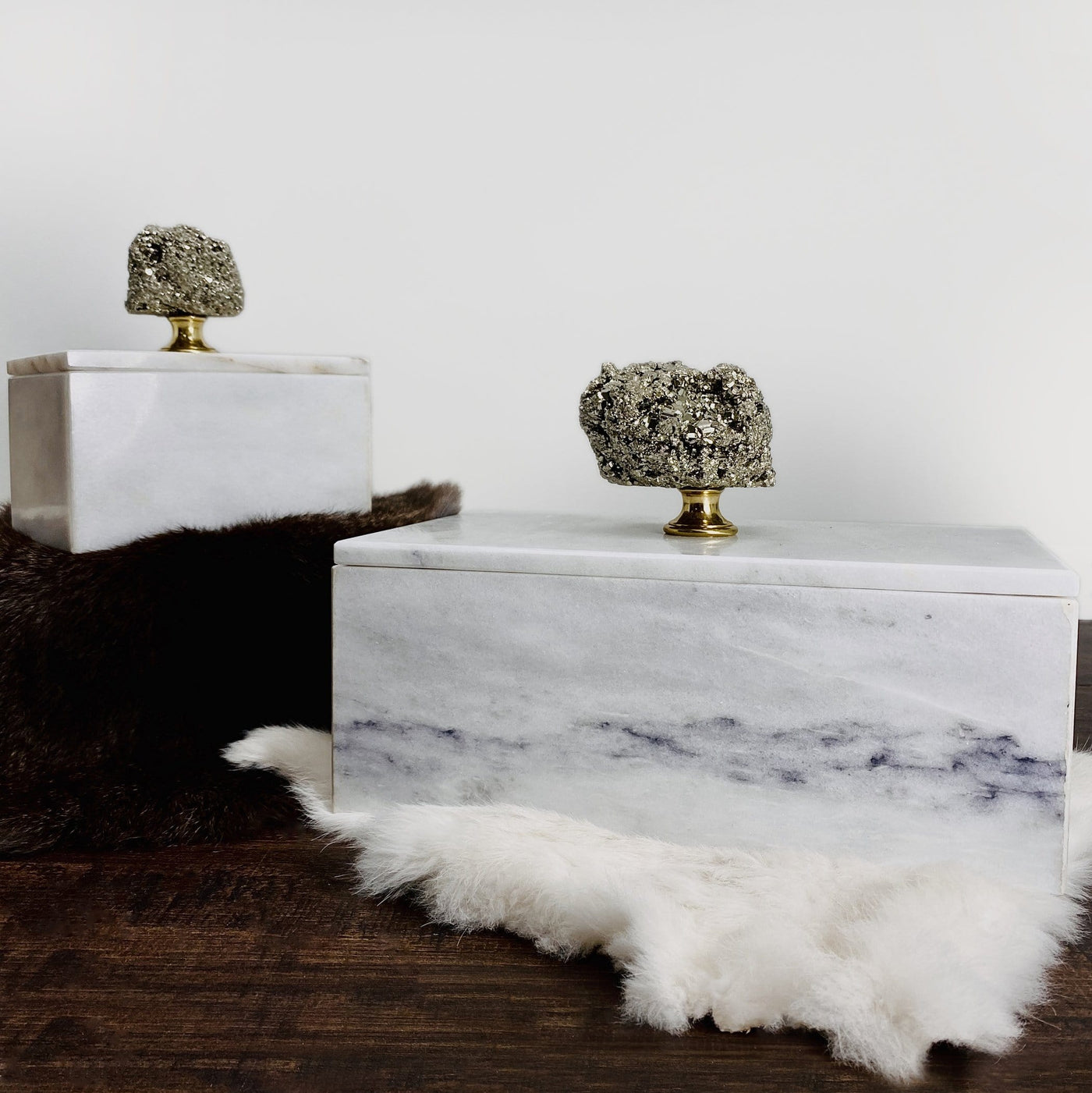 up close shot of 2 Pyrite Marble Boxes with decorations