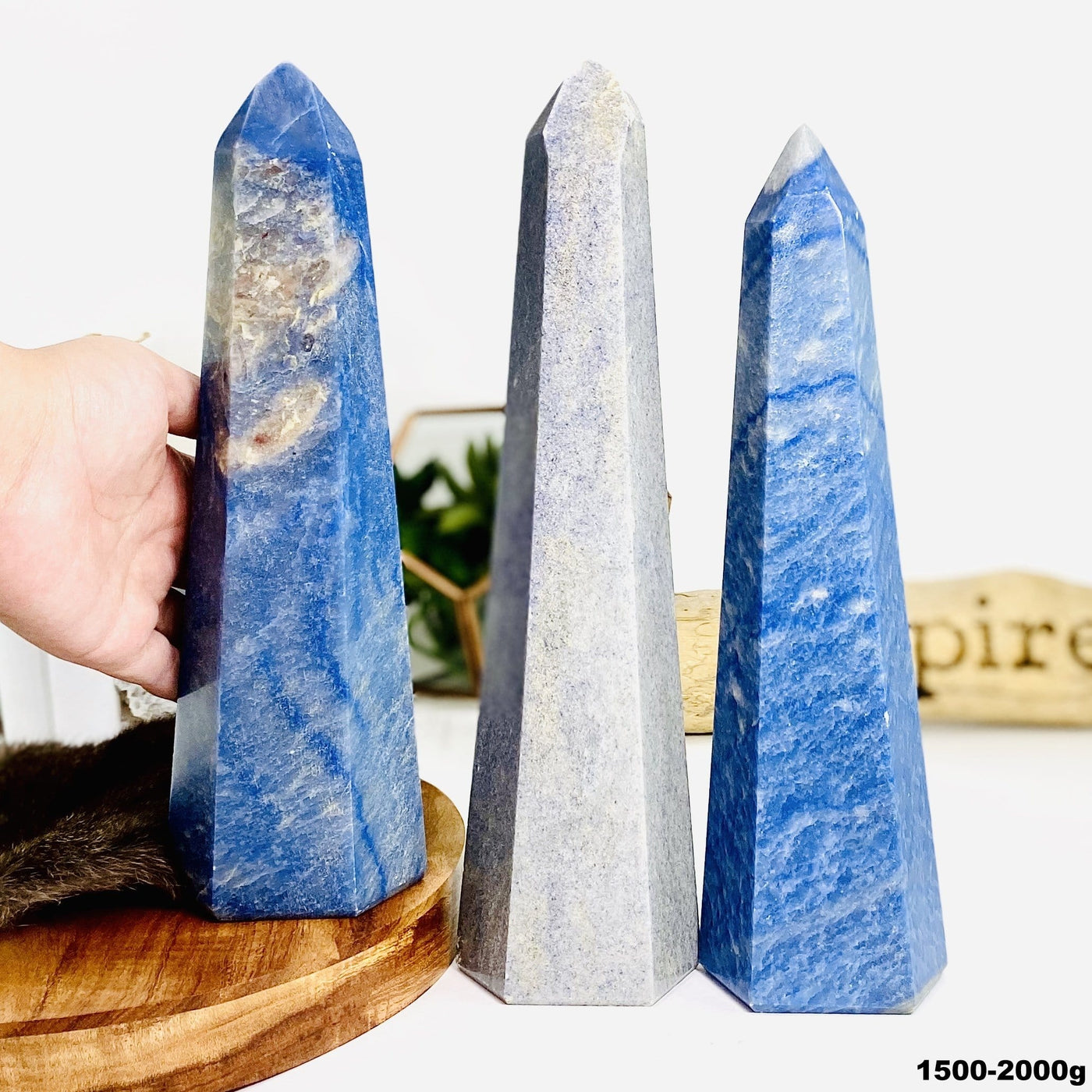 Three Blue Quartz Tower Points weighing at 1500-2000g in a variety of sizes