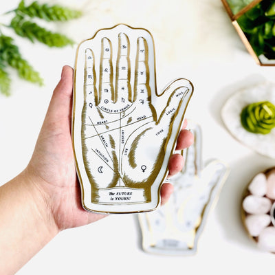 One white and gold Palmistry Hand The Future is Yours Shaped Porcelain Tray in hand