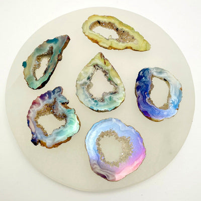 Picture of agate slices being displayed on a white background.