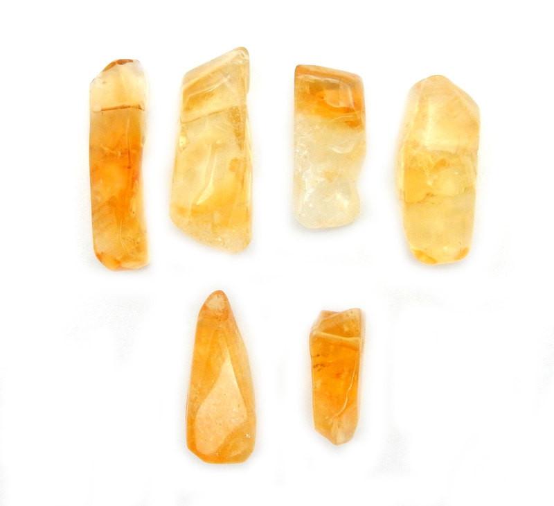 Citrine heat treated amethyst Freeform Top Side Drilled Beads displayed to show various color hues shapes and lengths between each bead