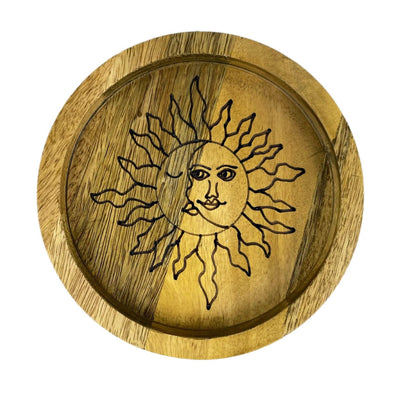 close up of small sun and moon mango wood tray