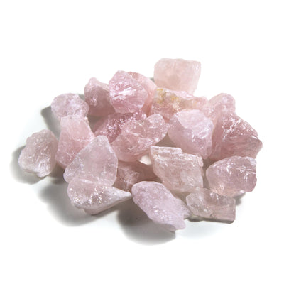 multiple rough stones displayed to show the differences in the pink color shades 
