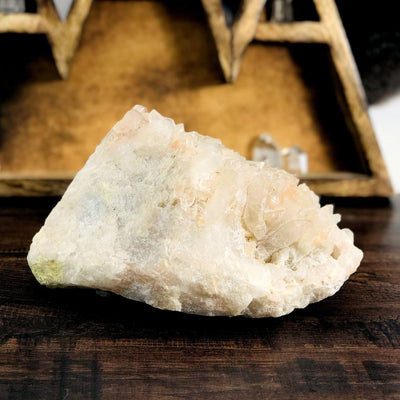 Madagascar Quartz Cluster with decorations in the background