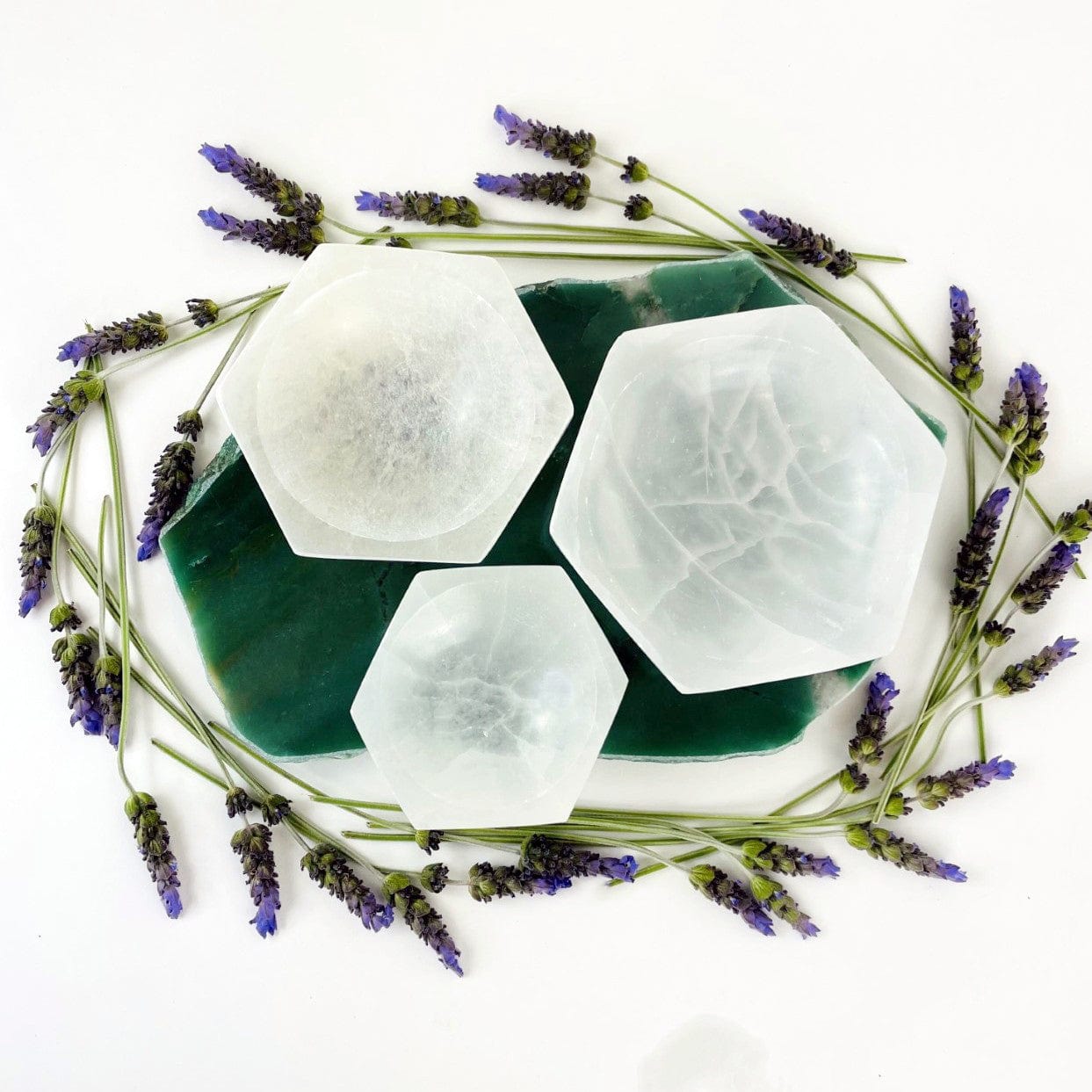 overhead view of empty hexagon selenite bowls