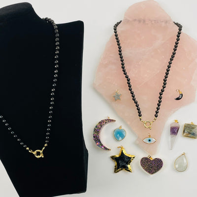 Shungite Candy Necklaces displayed with charms