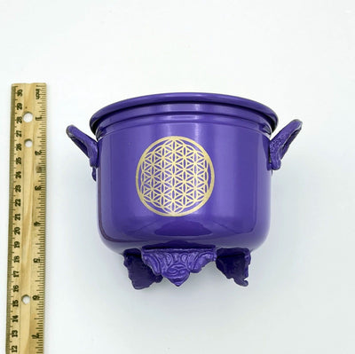 Metal Cauldron in purple next to ruler for size comparison