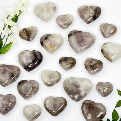 multiple super seven hearts showing different patterns and sizes on white background 