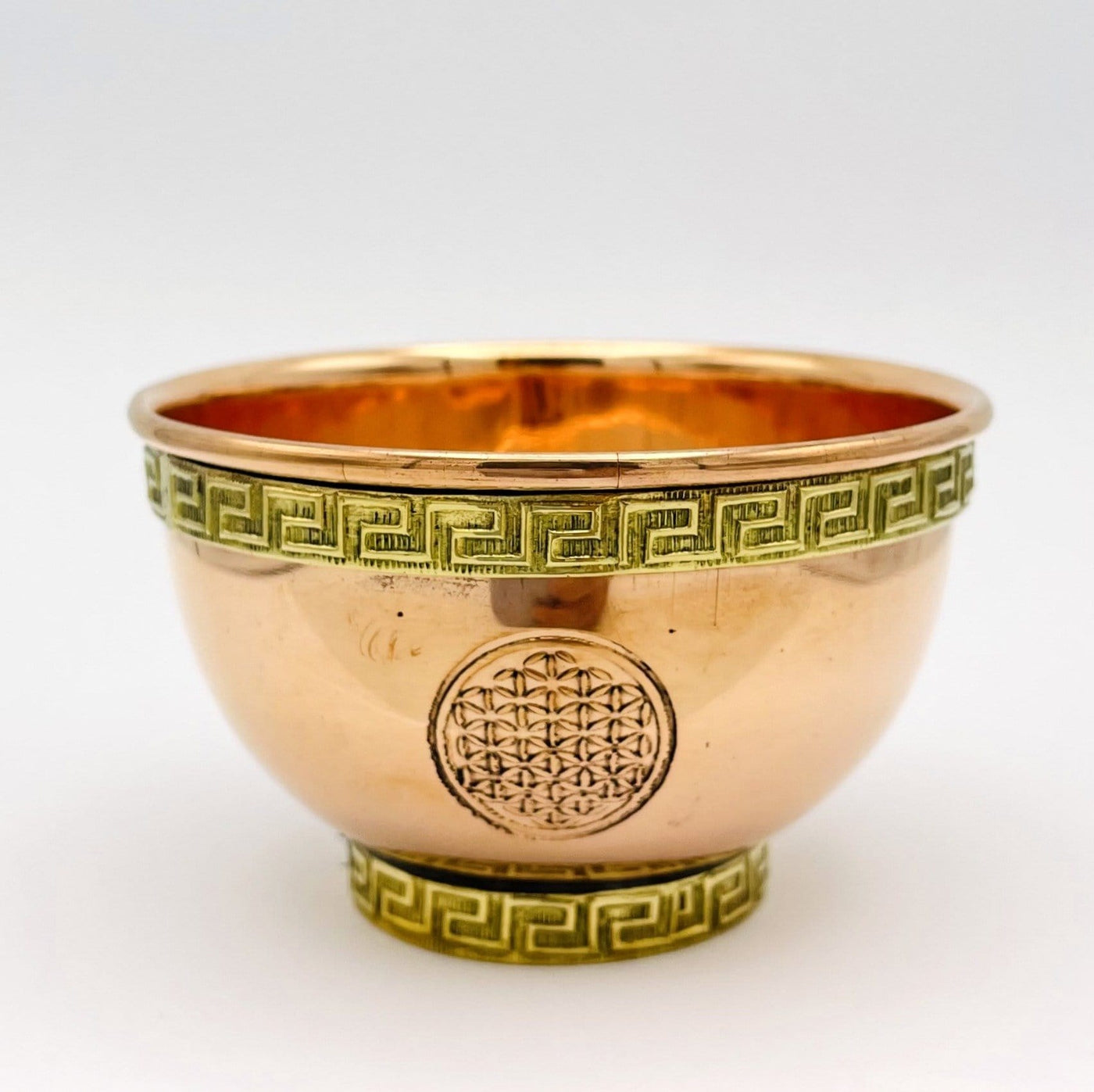 offering bowls have engraved designs on the top and the bottom portions