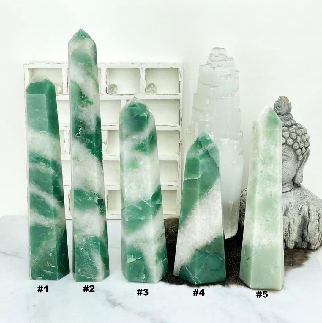 5 Green and White Quartz Polished Points on display with choice numbers called out