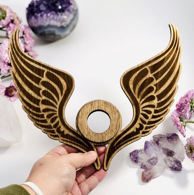 Angel Wings Wooden Sphere Stand - hand holding it