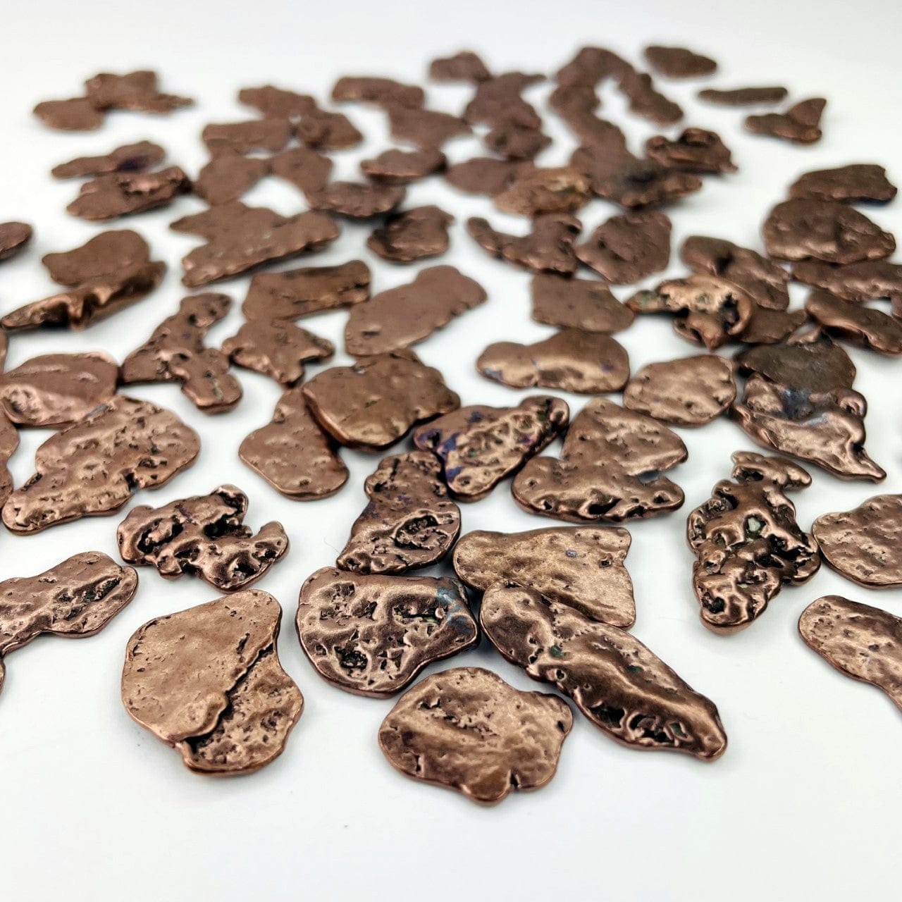 Copper Nuggets - Freeform Shapes from a side angle