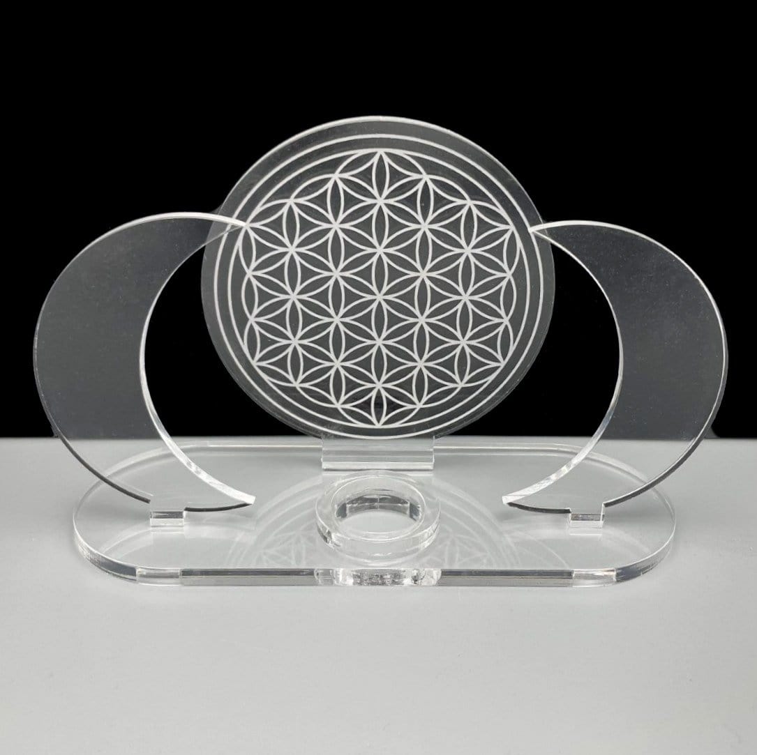 Acrylic Sphere Holder - Crescent Moons with Flower of Life displayed by itself.