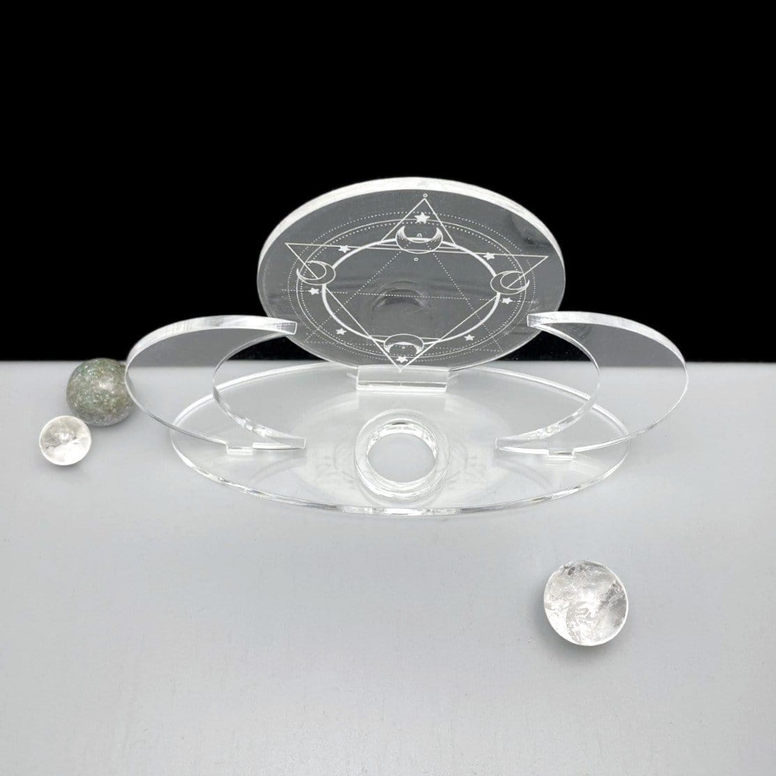 An empty Acrylic Sphere Holder Crescent Moons - Six Pointed Star surrounded with smaller spheres for display.