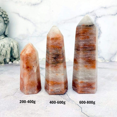 Hematoid Quartz Polished Towers show weight categories in 200-400g 400-600g 600-800g