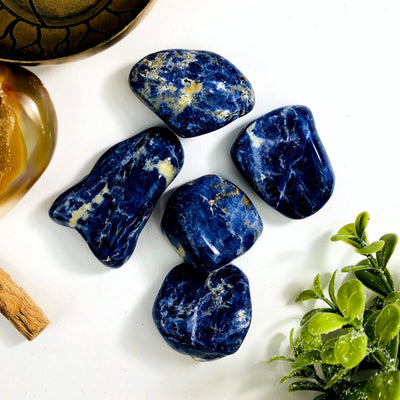 sodalite with decorations in the background