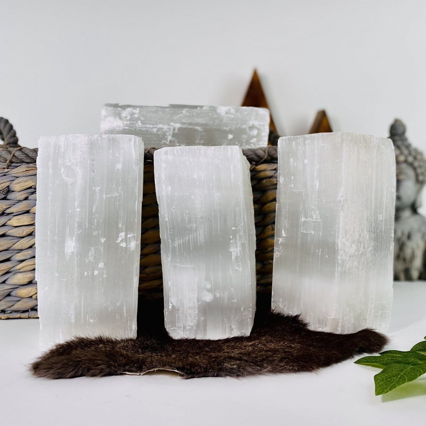 three large selenite logs on display for possible variations