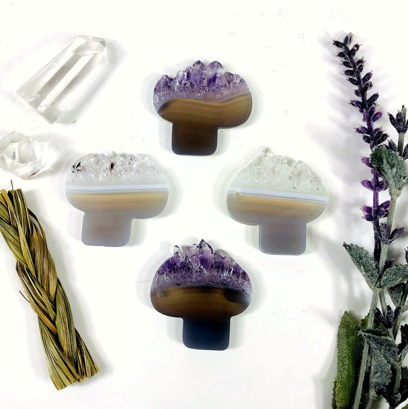 Amethyst Mushroom Shaped Large Cabochons, showing stock on hand of whites and greys to browns and purples