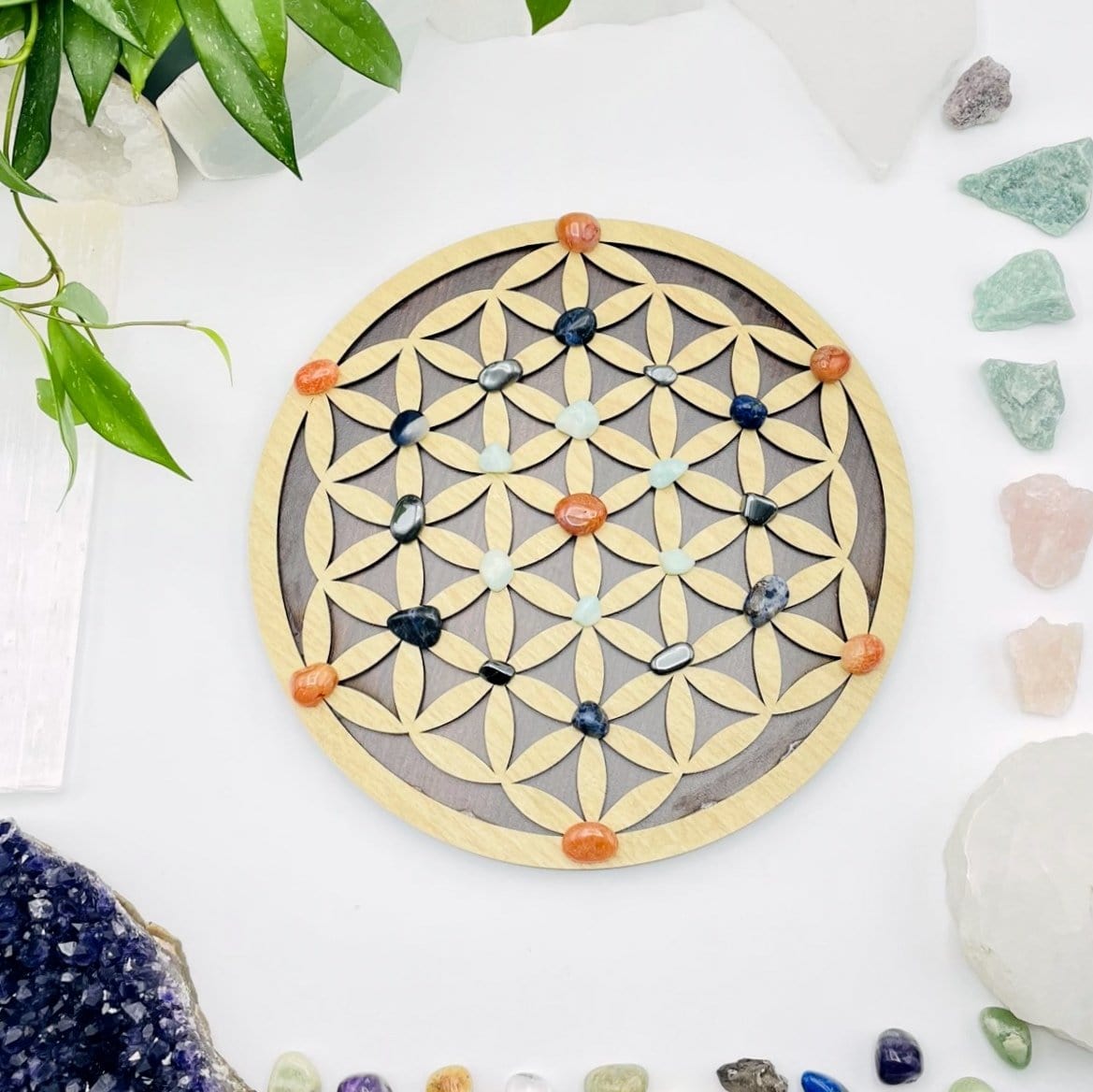 wooden flower of life crystal grid displayed as home decor 