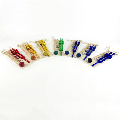 A Circle of All the 7 Chakra Tuning Forks and Mallets on Pouches