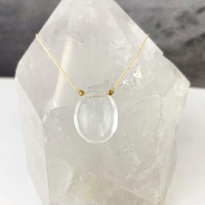 crystal quartz worry stone necklace up close