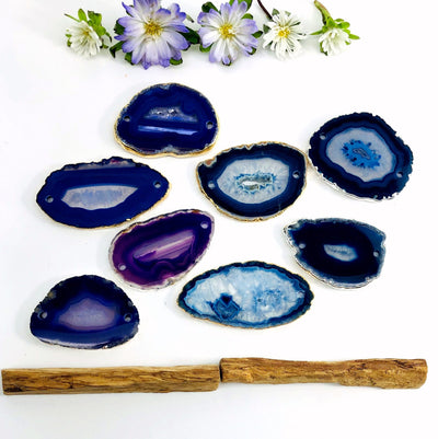 Picture of our purple and blue agate slice plated edge being displayed on a white back ground.