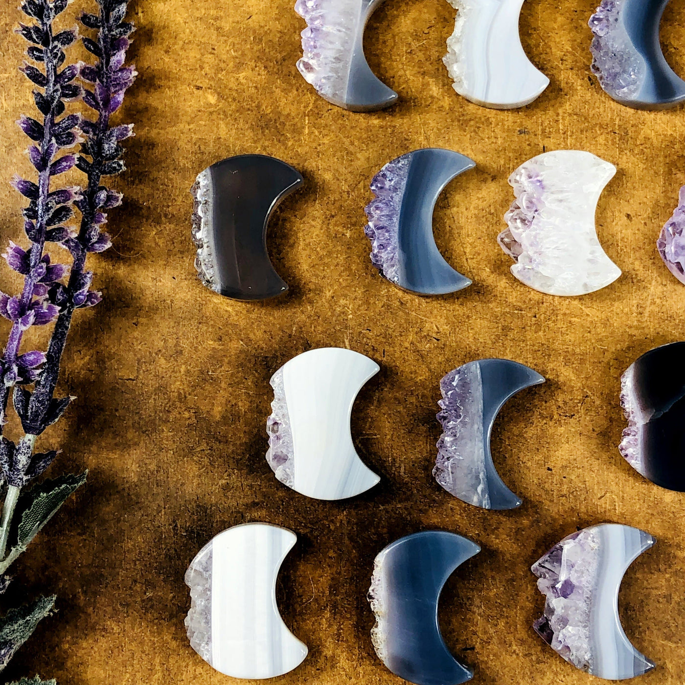 close up of amethyst moon slices showing the different color patterns 