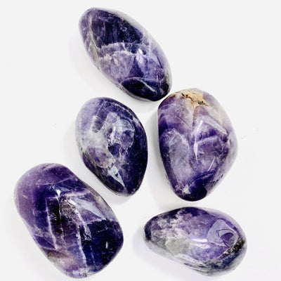 Chevron Amethyst Large Tumbled Stones - Close up view of stones