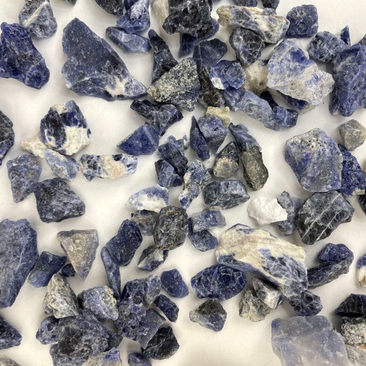 Sodalite Stones  spread out on a table