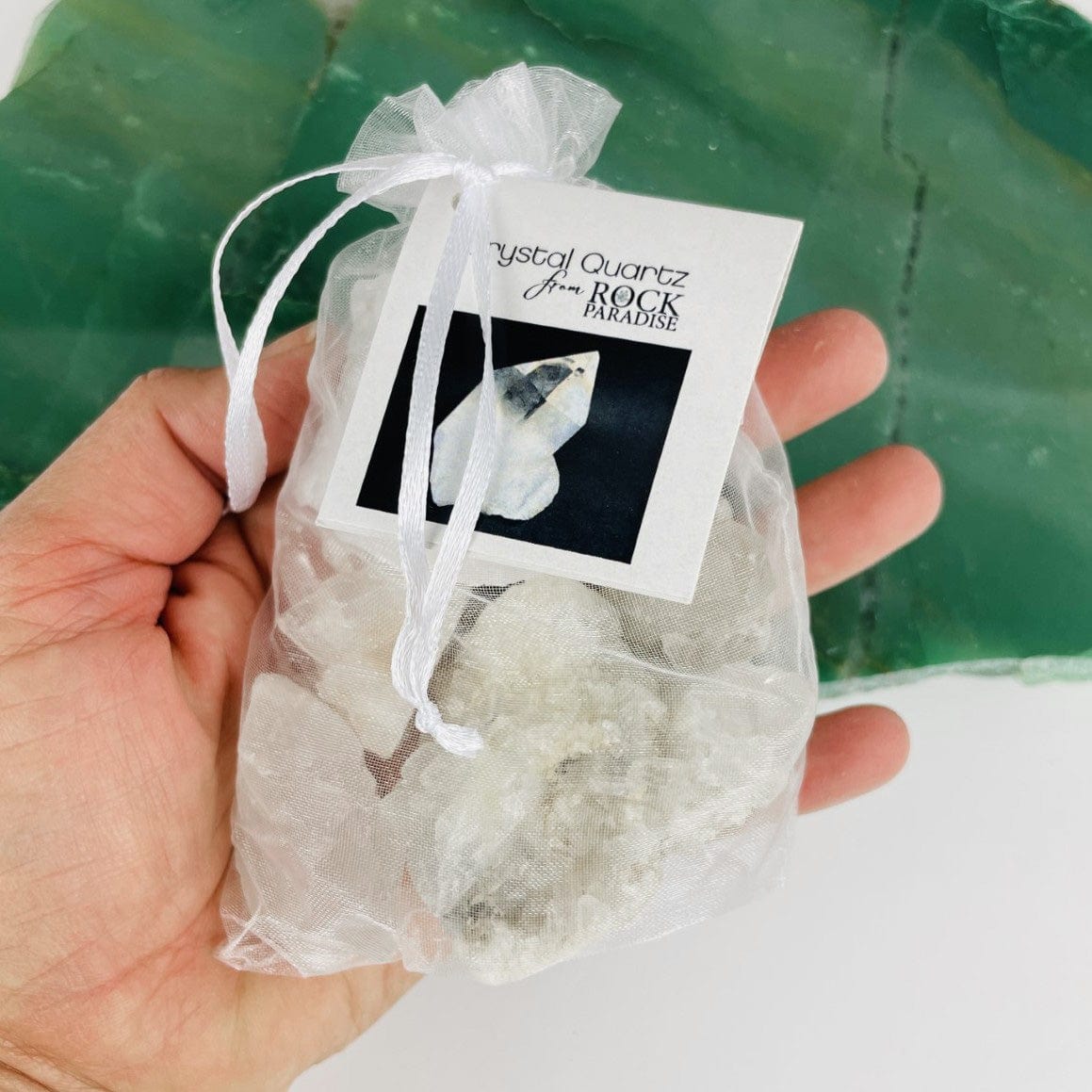 5 Crystal Clusters and Points "The Power Stones" Set in an organza bag tied and tagged with information card in a hand for size reference