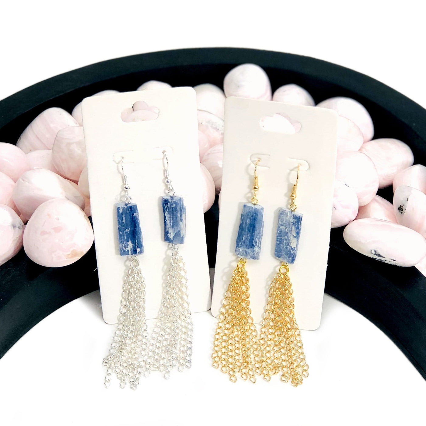 2 pairs of Blue Kyanite Dangle Earrings with Electroplated 24k Gold/Silver Tassels with decorations in the background