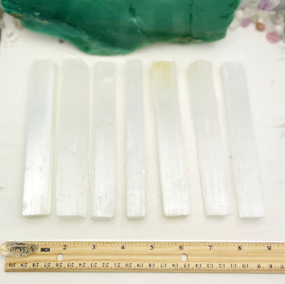 selenite bars with ruler for size reference
