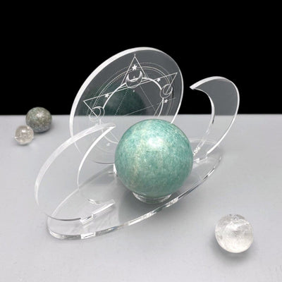 Shown from atop - Acrylic Sphere Holder Crescent Moons - Six Pointed Star holding a sphere.