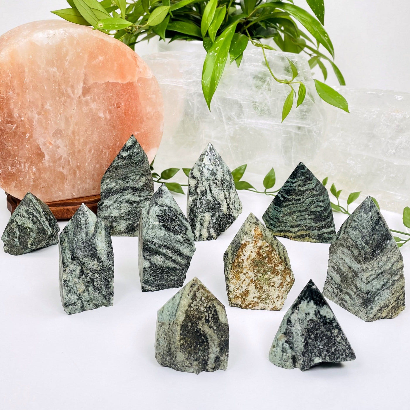multiple green snakeskin jasper points showing different sizes and patterns 