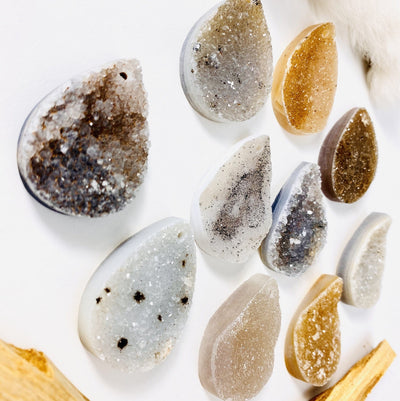 A verity of pieces of the Teardrop Druzy Cabochon Top Center Drilled