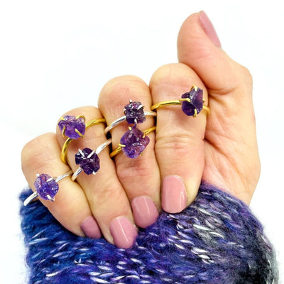 Gemstone Amethyst Ring in gold and silver on fingers