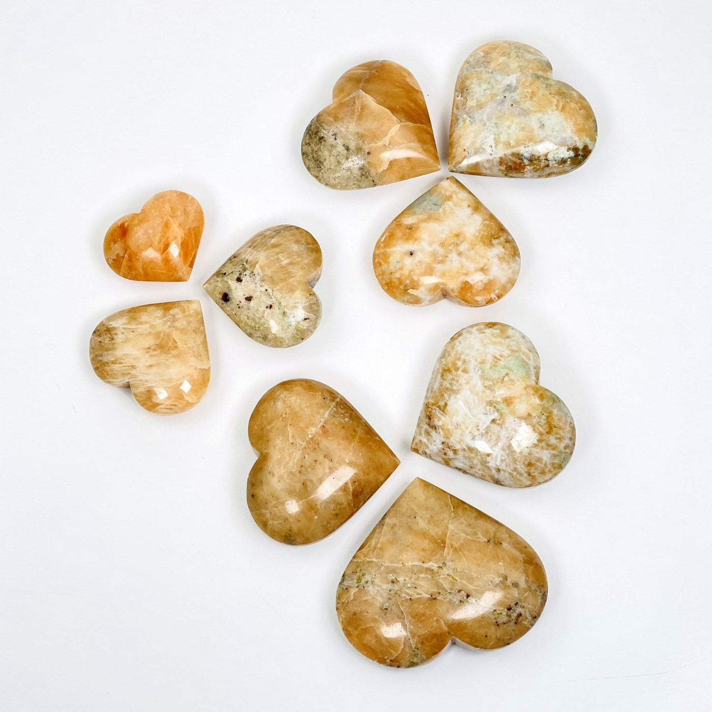 multiple orchid calcite hearts showing different patterns and sizes 