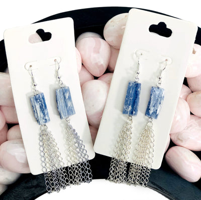 2 pairs of Blue Kyanite Dangle Earrings with Electroplated silver tassels with  decorations in the background