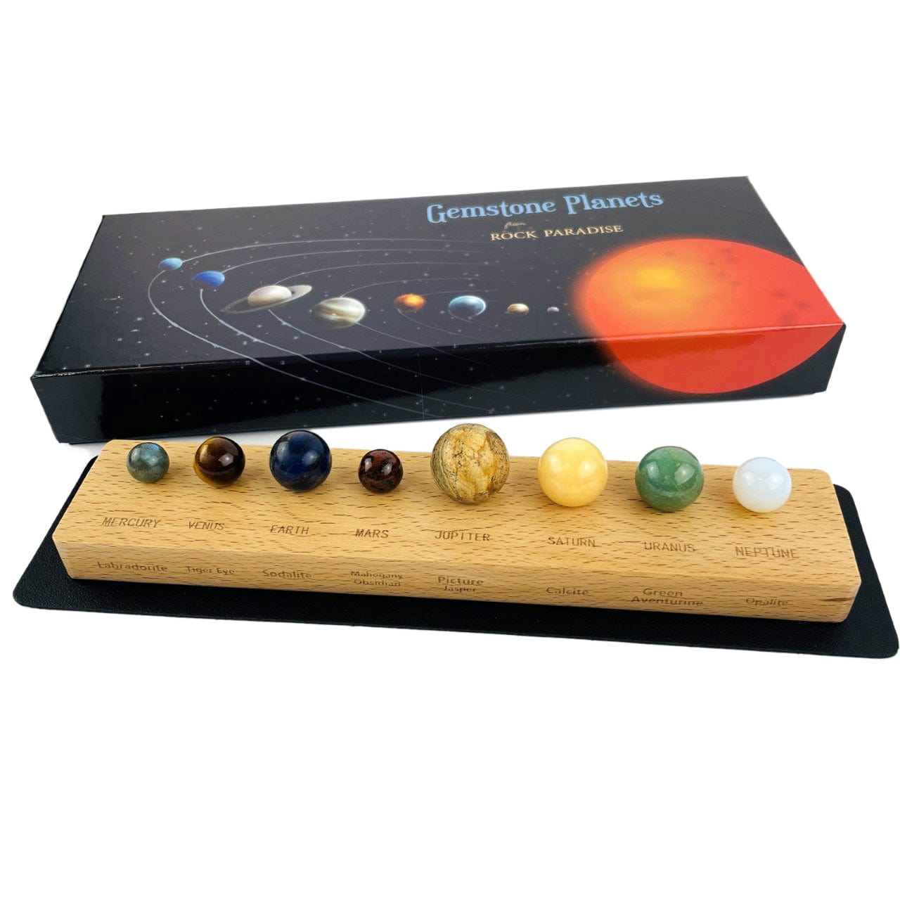 Gemstones planet box with a mat and wood base with all the stone planets in place