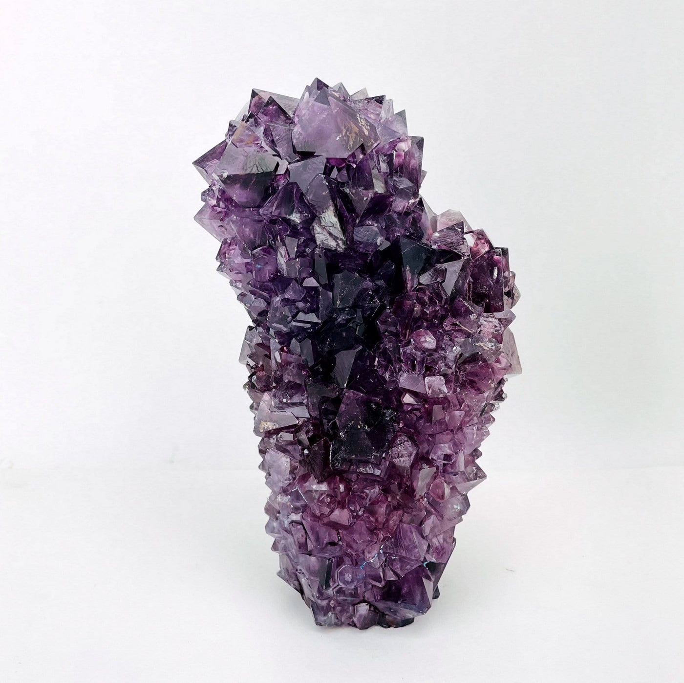 large purple salt crystal formation on display