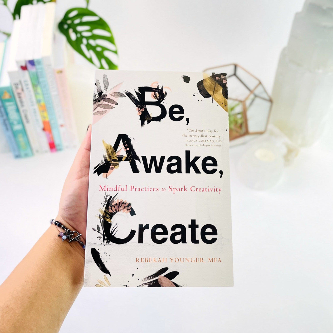 Be, Awake, Create book shown face up. Held in hand for size reference