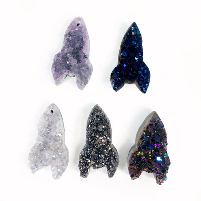 Druzy Rocket Shaped Cabochons  - 5 different colors on a table