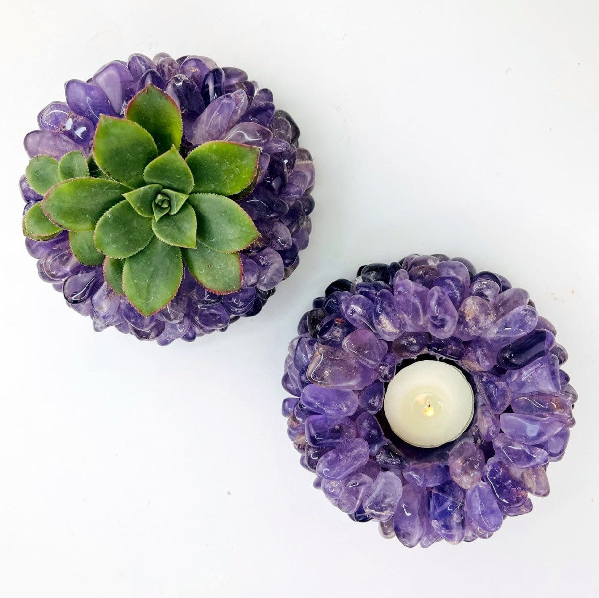 2 Amethyst Tumbled Crystal Candle Holders shown with a candle and plant