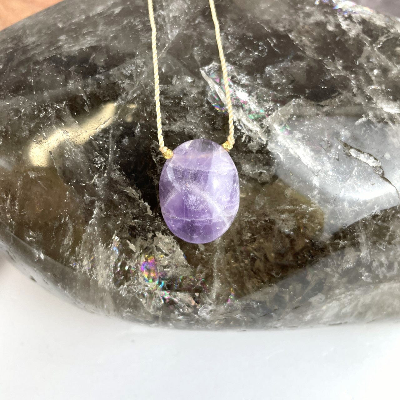 amethyst worry stone necklace up close