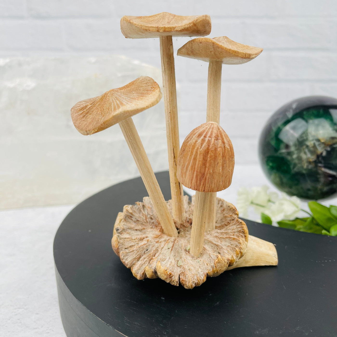 carved mushroom displayed as home decor