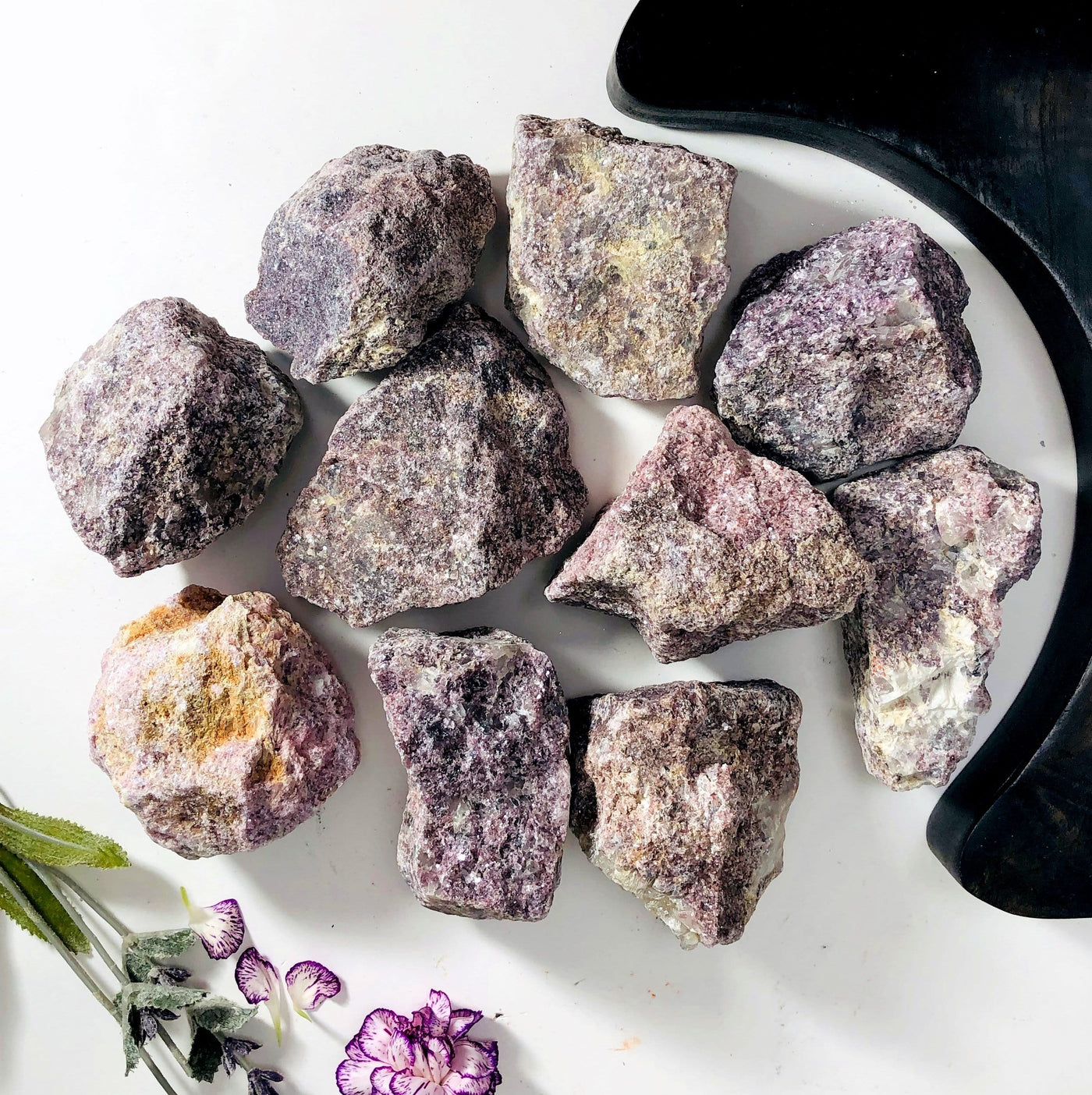 large Lepidolite Rough Stones displayed in various sizes colors texture shape