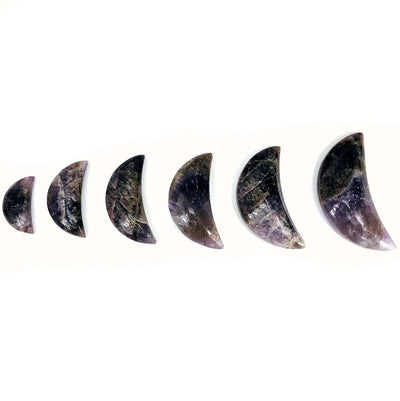 all seven minerals in one polished moon weight options on white background for size comparison
