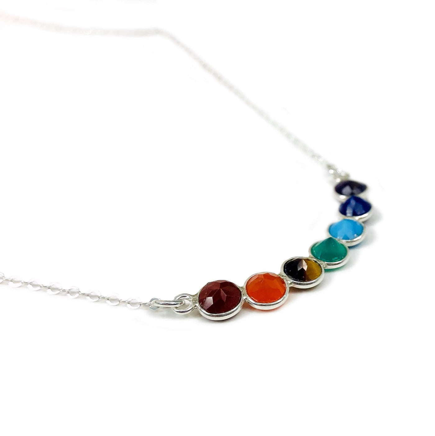 side view of the necklace showing the plated chakra stones