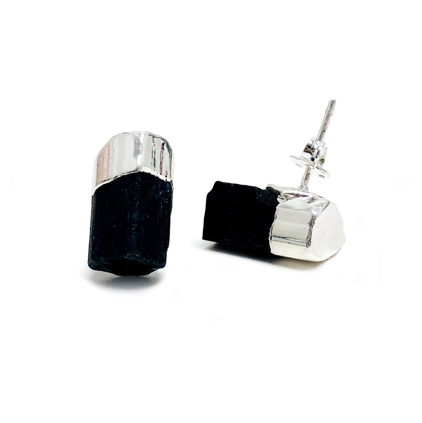 Black tourmaline small stud earrings with silver plated top on a white background.